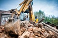 Hydraulic crusher excavator backoe machinery working on site Royalty Free Stock Photo