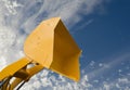 Hydraulic detail of crane arm and basket on sky background Royalty Free Stock Photo