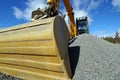 Hydraulic excavator against blue sky Royalty Free Stock Photo