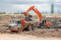 Hydraulic Excavator, Articulated Dump Truck Landfill Clearing