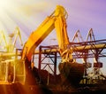 Hydraulic excavator at work. Shovel bucket against blue sky Royalty Free Stock Photo