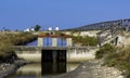 Hydraulic gateway with wooden gate in sea salt channel of Margherita di Savoia