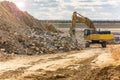 Hydraulic hammer in the construction works of a road Royalty Free Stock Photo