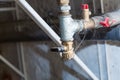 Hydraulic pipes an valves in basement Royalty Free Stock Photo