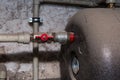 Hydraulic pipes an valves in basement Royalty Free Stock Photo