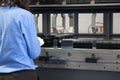 The hydraulic press machine operator working at press machine Royalty Free Stock Photo