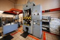 Hydraulic press for rubber and plastic casting in workshop Royalty Free Stock Photo