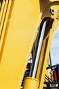 Hydraulics tractor yellow Royalty Free Stock Photo