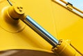 Hydraulics tractor yellow Royalty Free Stock Photo