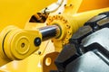 Hydraulics tractor yellow Royalty Free Stock Photo