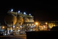 Hydrochloric acid tanks of refinery at night. Tessenderlo, Flanders, Belgium, Europe