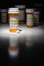 Hydrocodone Pills and Prescription Bottles with Non Proprietary Labels Royalty Free Stock Photo