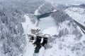 Hydroelectric power station with weir system on the Lech river on the motorway in winter