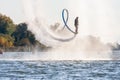 Hydroflight sportsman flying on flyboard at South Russian Aquabike Championship