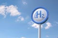 Hydrogen fuel logo sign with blue sky background. 3d illustration