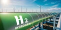 h2. hydrogen pipeline with wind turbines power plants in background. transformation of energy sector towards to ecology zero Royalty Free Stock Photo