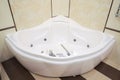Hydromassage bath in the bathroom interior Royalty Free Stock Photo