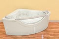 Hydromassage tub in room near wall, 3D rendering Royalty Free Stock Photo