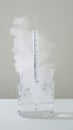Hydrometer measuring density of fog in beaker experiment Royalty Free Stock Photo