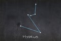 Hydrus constellation drawn on a blackboard