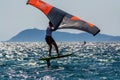 Hyeres, Almanarre beach, France, July 10, 2021. Extreem water sport - wing foil, kite surfing, wind surfindg, windy day on