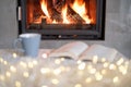 Hygge concept with book and tea