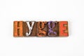 HYGGE, Danish lifestyle concept. Colored wooden alphabet letters on a white background