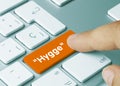 Hygge Inscription on Orange Keyboard Key. Royalty Free Stock Photo