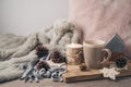 Hygge Scandinavian style concept with coffee cup, candles and pi