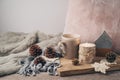 Hygge Scandinavian style concept with coffee cup, candles and pi