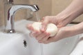 Hygiene. Cleaning Hands. Washing hands with soap. Woman`s hand with foam. Protect yourself from coronavirus COVID-19 pandemia Royalty Free Stock Photo