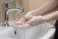 Hygiene. Cleaning Hands. Washing hands with soap. Woman`s hand with foam. Protect yourself from coronavirus COVID-19 pandemia Royalty Free Stock Photo