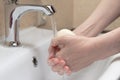 Hygiene. Cleaning Hands. Washing hands with soap. Woman& x27;s hand with foam. Protect yourself from coronavirus COVID-19 Royalty Free Stock Photo