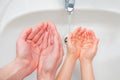 Hygiene concept, thorough hand washing with water and soap, important infection prevention against contagious disease Royalty Free Stock Photo