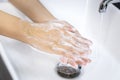 Hygiene concept. washing hands with soap in sinks, keep clean to protect from virus and bacteria disease.