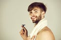 Hygiene and grooming of happy man smiling with safety razor Royalty Free Stock Photo