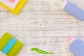 Hygiene items for the child. Bath accessories on light grey wooden background top view space for text frame Royalty Free Stock Photo