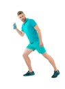 Hygiene runs the health. Man sportswear running with bottle of shower gel white background. Regular swimmer knows Royalty Free Stock Photo