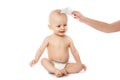 Hygiene - young momy wiping the baby skin with wet wipes. concept cleaning wipe, pure Royalty Free Stock Photo