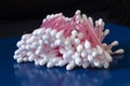 Hygienic cotton swabs on a blue table