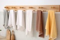 Hygienic Kitchen colorful towels hanging on rack. Generate AI