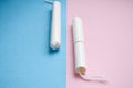 Hygienic tampons on a blue and pink background. copy space, Menstruation sanitary tampon for woman hygiene protection. Critical Royalty Free Stock Photo