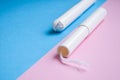 Hygienic tampons on a blue and pink background. copy space, Menstruation sanitary tampon for woman hygiene protection. Critical Royalty Free Stock Photo