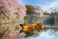 Himeji castle moat boat tour during full bloom cherry blossom in Hyogo, Japan Royalty Free Stock Photo