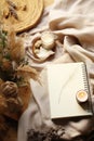 Hyper Realistic Flat-Lay Photography of Minimalist Notebook, An up-close view of a solitary notebook with a black metal