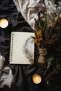 Hyper Realistic Flat-Lay Photography of Minimalist Notebook, An up-close view of a solitary notebook with a black metal