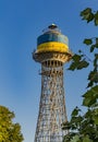 Hyperboloid water tower of engineer Shukhov in Cherkasy, Ukraine. Ukrainian flag colors