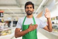 Hypermarket employee making oath