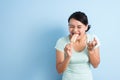 Hypersensitive teeth eating ice lolly Royalty Free Stock Photo