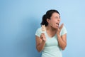 Hypersensitive teeth eating ice lolly Royalty Free Stock Photo